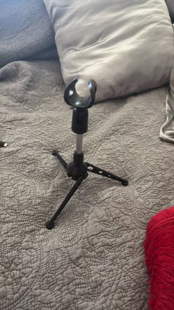 mic stand comes with smaller attachments