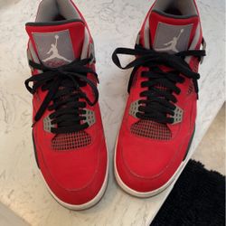 Jordan 4s Toro Reds 