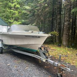 Boat motor and trailer for sale