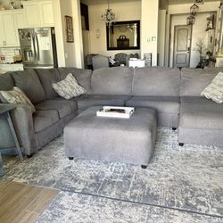 Gray sectional And Ottoman 