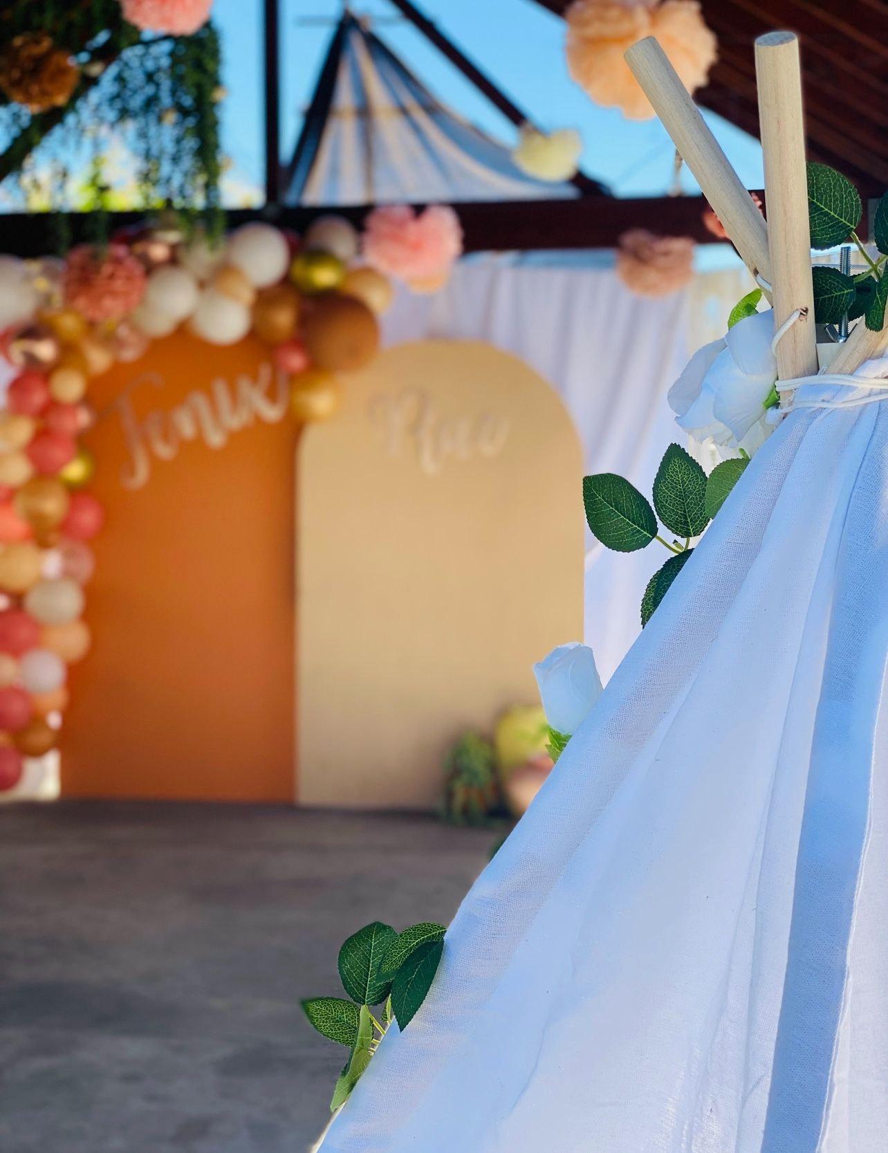 Greenery Garland, gold baskets, and garland roses used for baby shower