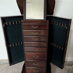 Powell Jewelry Armoire with Mirror is a unique jewelry cabinet you'll use to organize your necklaces, earrings, rings, bracelets ... any jewelry or sm