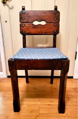 Vintage Dark-Stained Wooden Chair with Blue-patterned Seat Cushion