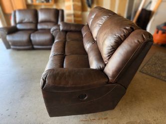 2 piece Ashley’s Furniture Leather Recliner Couches