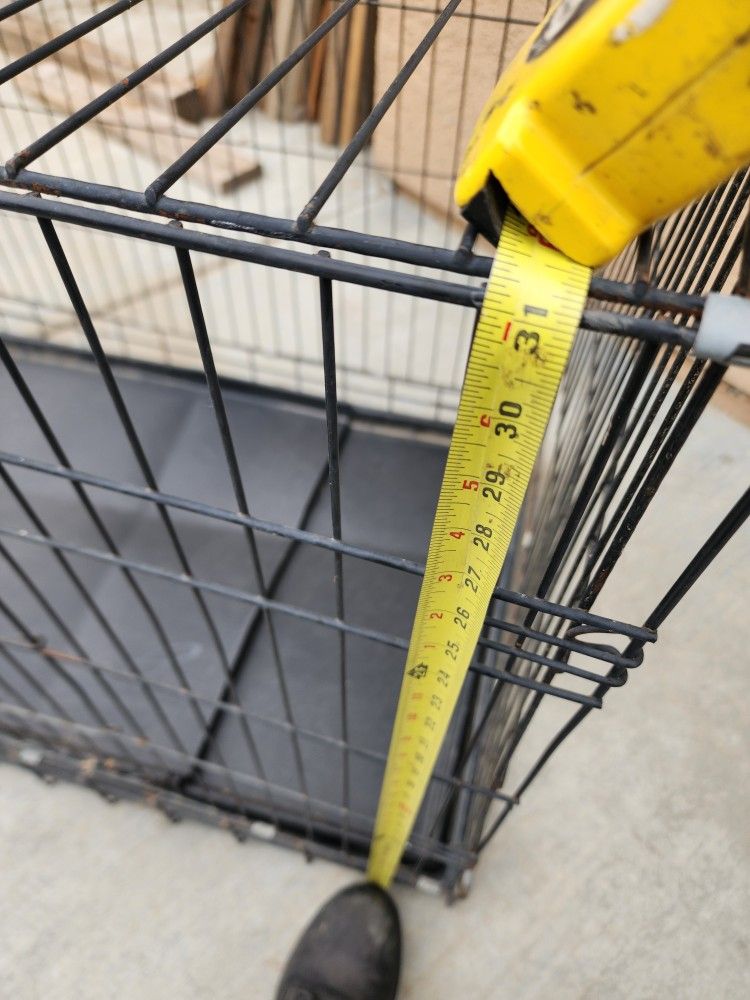 Two dog cages Size 42" large $40 Each