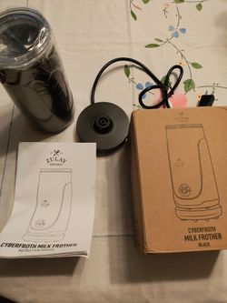 Electric milk frother. Never used