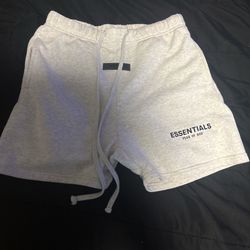 Essentials fear of god light grey shorts 