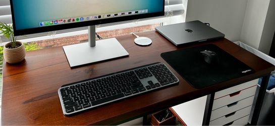 Walnut/mahogany finish desk with black frame