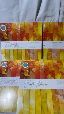 4 packs of brand new THE ESSENTIAL CRAFT PAPER books .