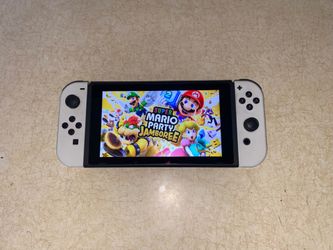 Nintendo Switch with 120 Switch Games and 7500 Classic Games