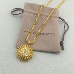 David Yurman 18K gold & diamond starburst pendant on 18 inch yellow gold chain