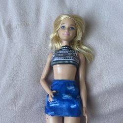 Barbie doll with clothes