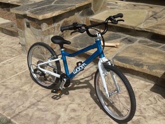 Woom 4 go  7 speed brand new never ridden just put it together save yourself alittle money