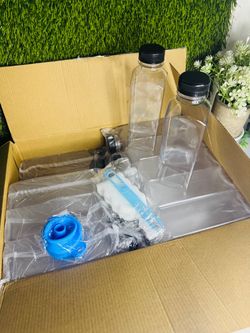 Plastic juice storage bottles with lids! Brand new in box