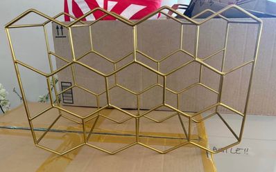 Crate and barrel gold wine rack