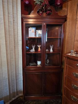 Curio corner cabinet