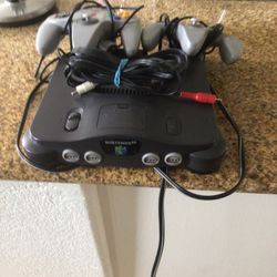 Nintendo 64 Two Controllers works perfect very good condition