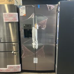 GE - Side By Side Refrigerator with Water and Ice Dispenser - Stainless Steel 