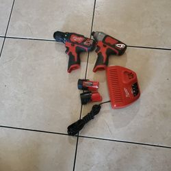 MILWAUKEE IMPACT AND DRILL  12.VOLT USED 