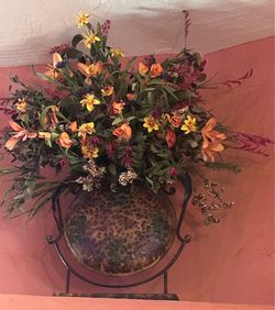 Hammered Metal Vase with Iron Stand and Faux Floral Arrangement