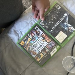 Xbox one with two game and a mic and controller