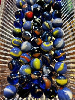 70 Collectible Blue Marbles & 1 Neptune Shooter