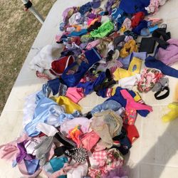 Barbies And Doll Clothes And A Few Small Dolls Lot 