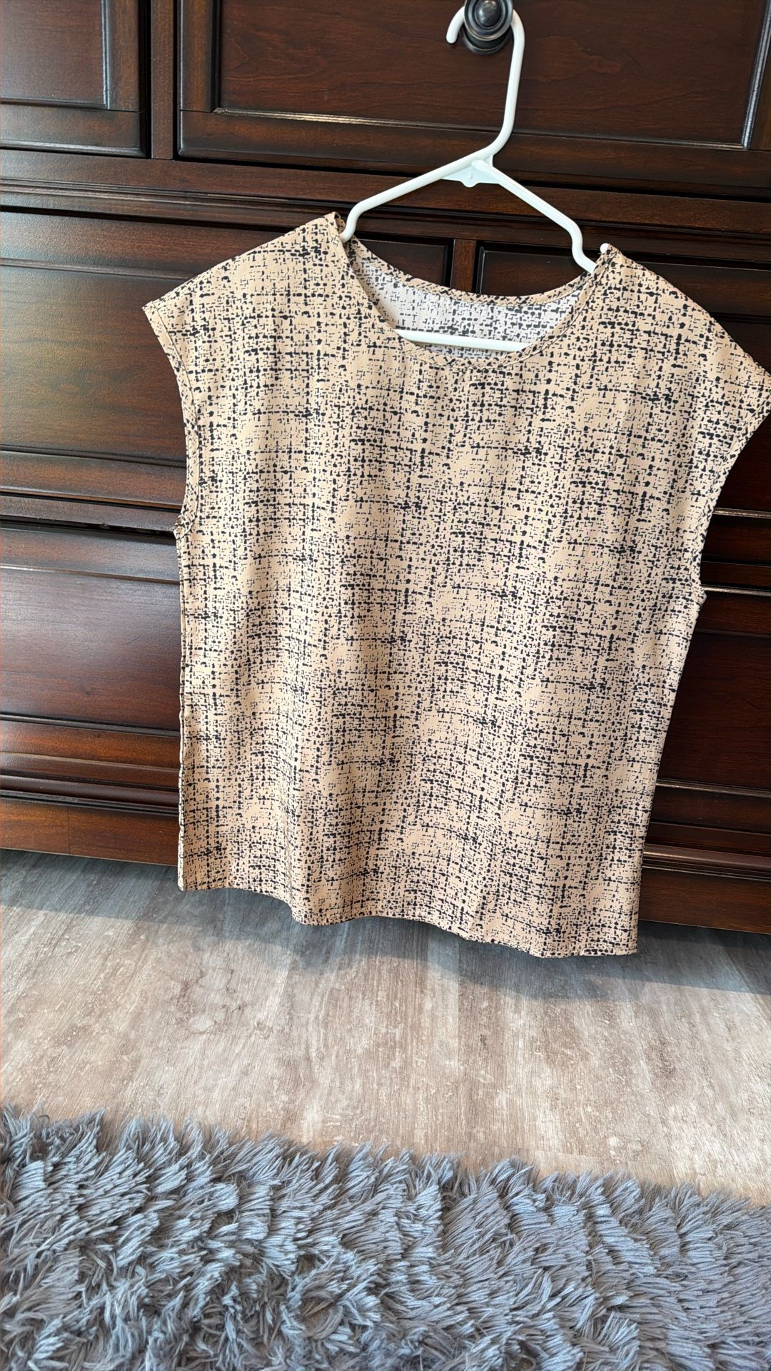 New Brown With Black Going Through It. It’s A Summer Shirt Short Sleeves As You Can See.