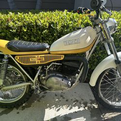 1974 Yamaha TY250 Trials Motorcycle for sale. White with Yellow color. 5 speed transmission.  Runs, shifts drives.  New Bridgestone TW model tires.  R