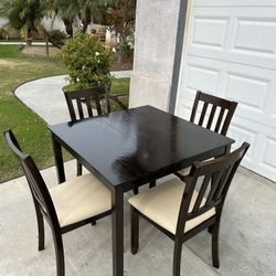 Dining table comes with 4 chairs