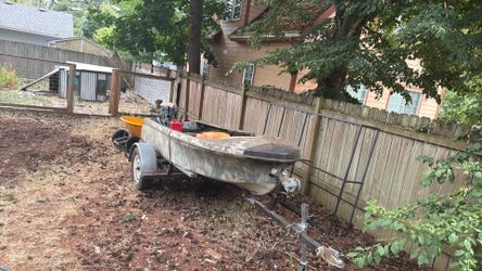 Trade or cash, 12 ft fiberglass jonboat- with engine. Ran last year, won’t start