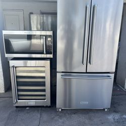 Kitchenaid Fridge, Microwave And Under Counter Wine Cooler. Everything Works Perfect In Good Condition.