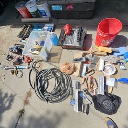 Bunch Of Tools, Paint, And Garden Stuff