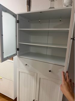 Tall white cabinet