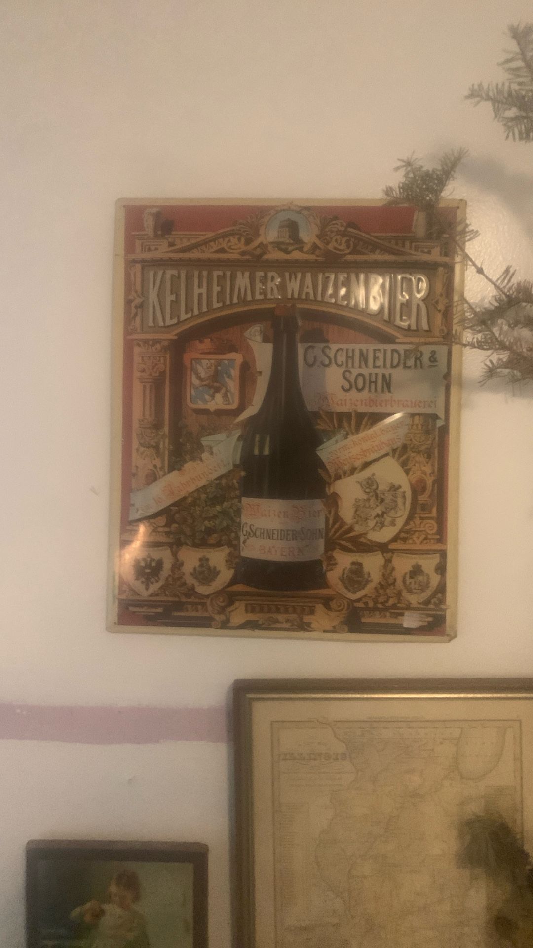 vintage-style tin sign for "Kelheimer Waizenbier.