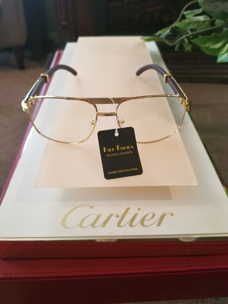 Cartier clear aviator style glasses very classy