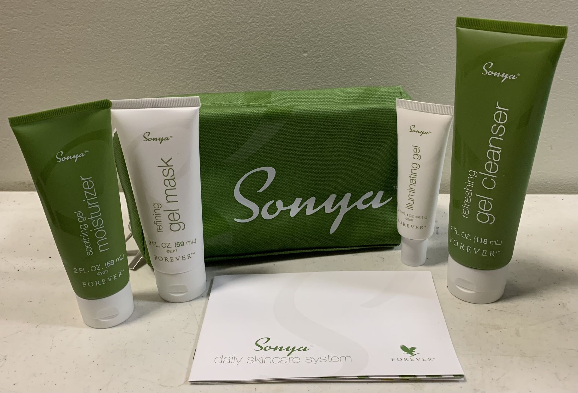 New Forever Living Sonya daily skincare system - soothing gel moisturizer - refining gel mask - illuminating gel - refreshing gel cleanser - zippered