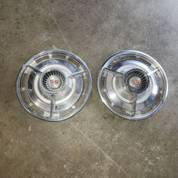 2 Chevy Hubcaps