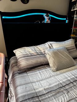 Cama Queen.