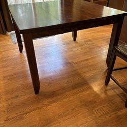 Bar Height Table And 8 Chairs