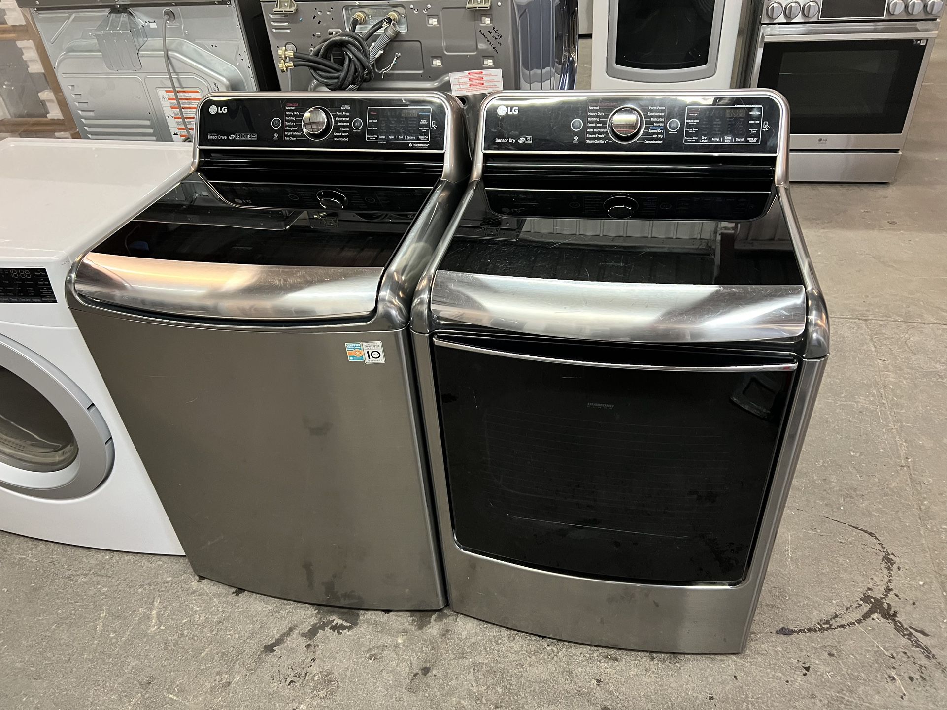 Mega capacity, graphite, steel LG laundry set with electric dryer can deliver  Retail price around $2200 WASHER= 5.7 Cu.Ft. Mega Capacity Top Load Was