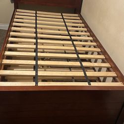 Twin Size Bed Frame with Pull Out Mattress, Drawers, And Cabinets 
