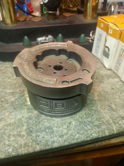 Vintage GM Locomotive Group brass cylinder head paper weight.