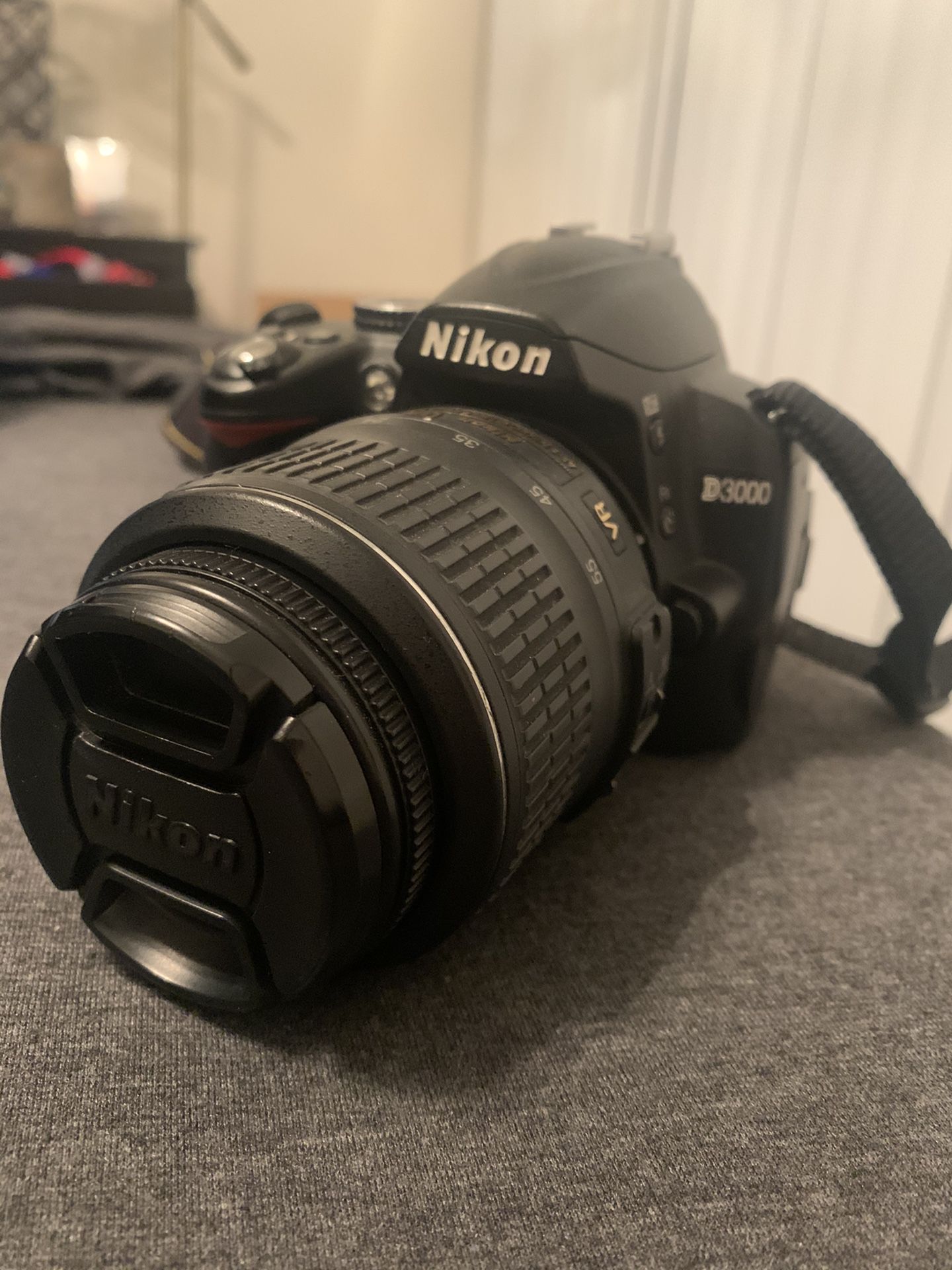 Nikon D3000 10MP Digital SLR Camera with 18-55mm f/3.5-5.6G Zoom Lens
