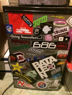 Small fridge personalized, dorm style.