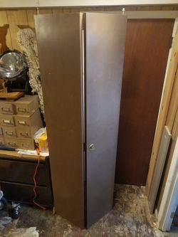 30 by 80 metal bi-fold door with Hardware