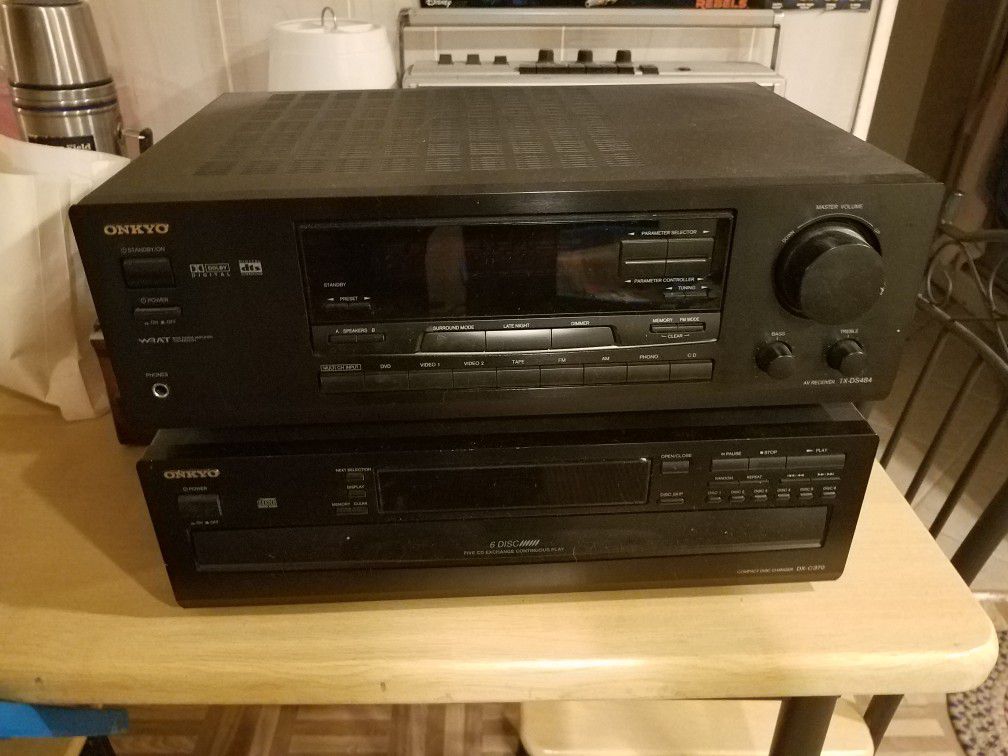 Okyno stereo system with 6 CD changer, Sony speakers and 2 remotes.askjng 125.00