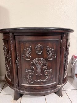 Ornate Carved Wood Demilune Cabinet with Stone Top