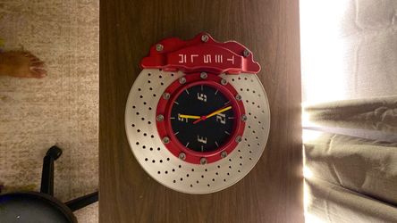 TESLA brake rotor clock