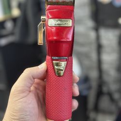 Red Babyliss With Stand Up Charging Port